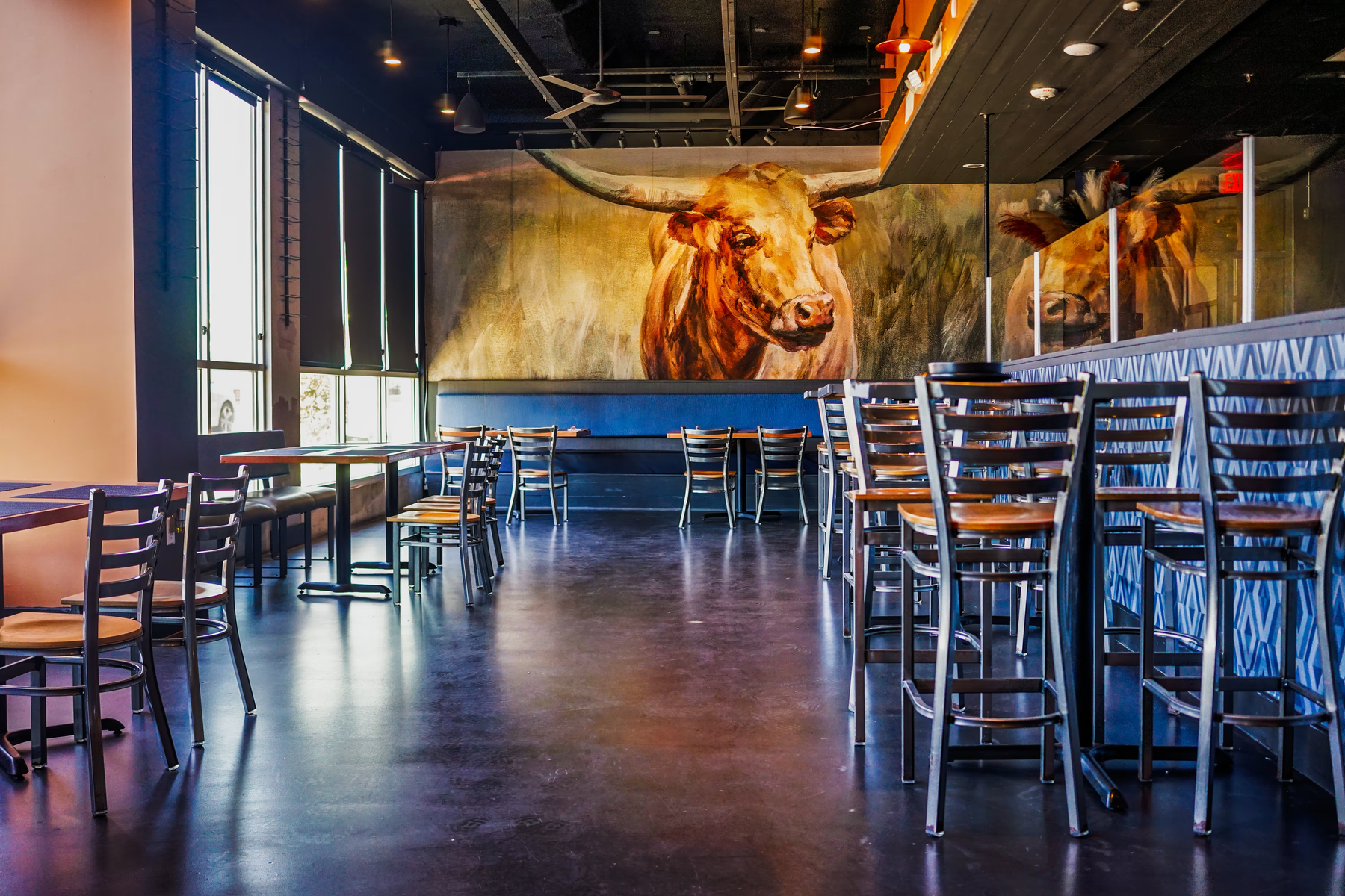District Prime dining room with mural